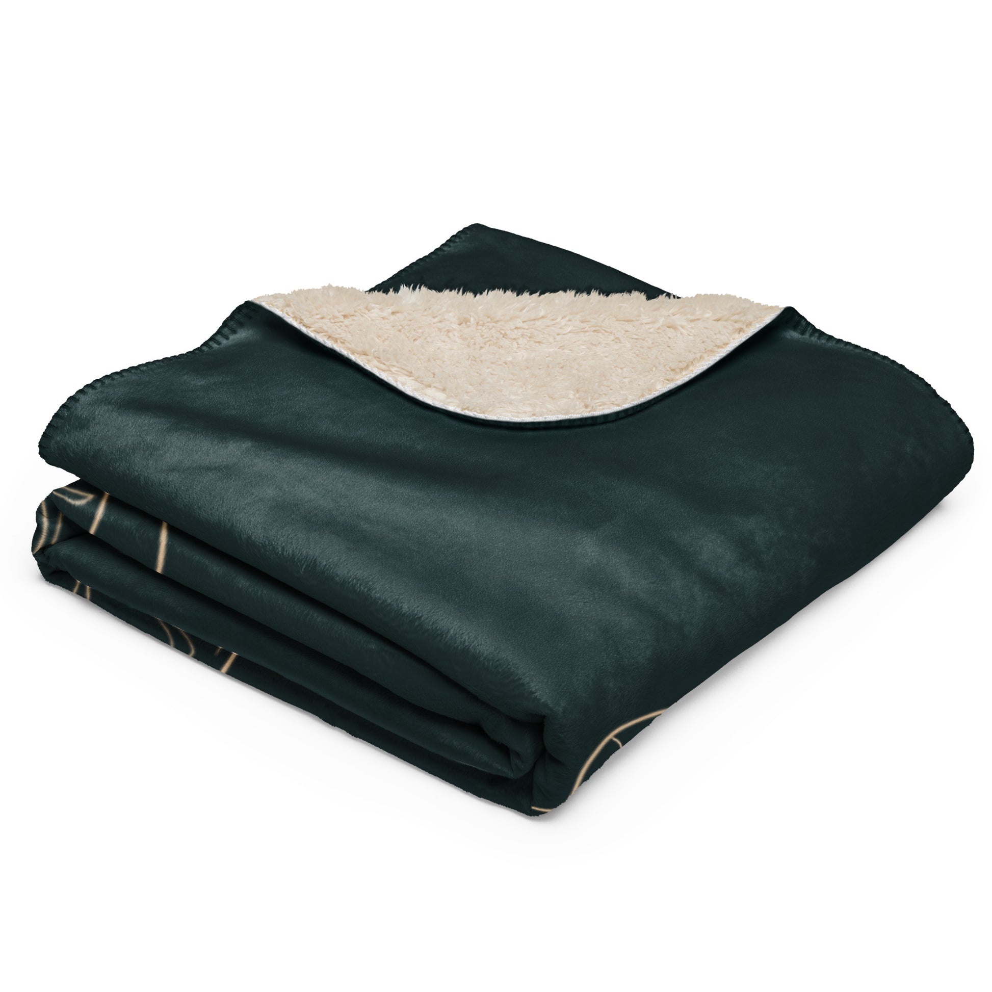 Folded dark green blanket with beige interior on a white background