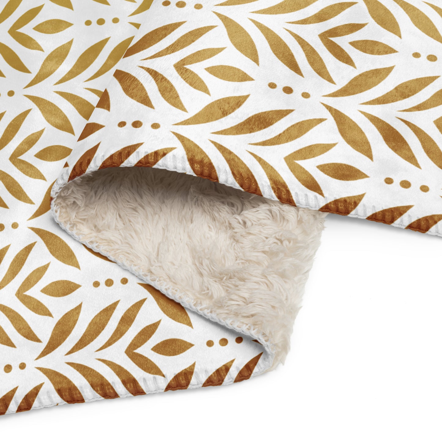 Sherpa blanket featuring a gold leaf pattern and “Paws and Praise” lettering in warm tones, a faith-inspired design that symbolizes gratitude, comfort, and the love between pets and their owners.