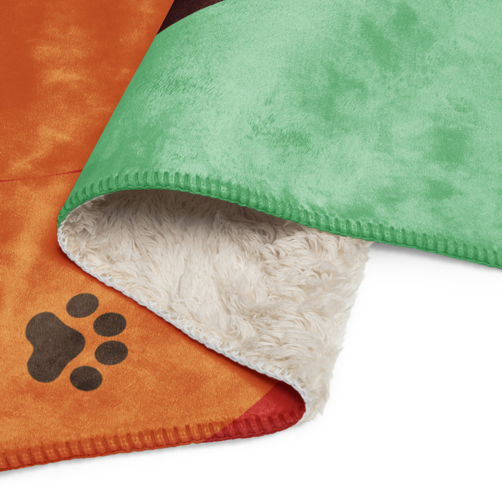 Sherpa blanket with orange, teal, and red geometric mid-century design featuring a black paw print in the corner, Pets N’ Faith faith-inspired throw