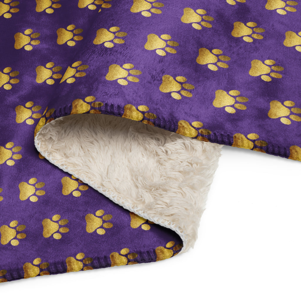 Indigo sherpa blanket with gold paw print design for Pets N' Faith
