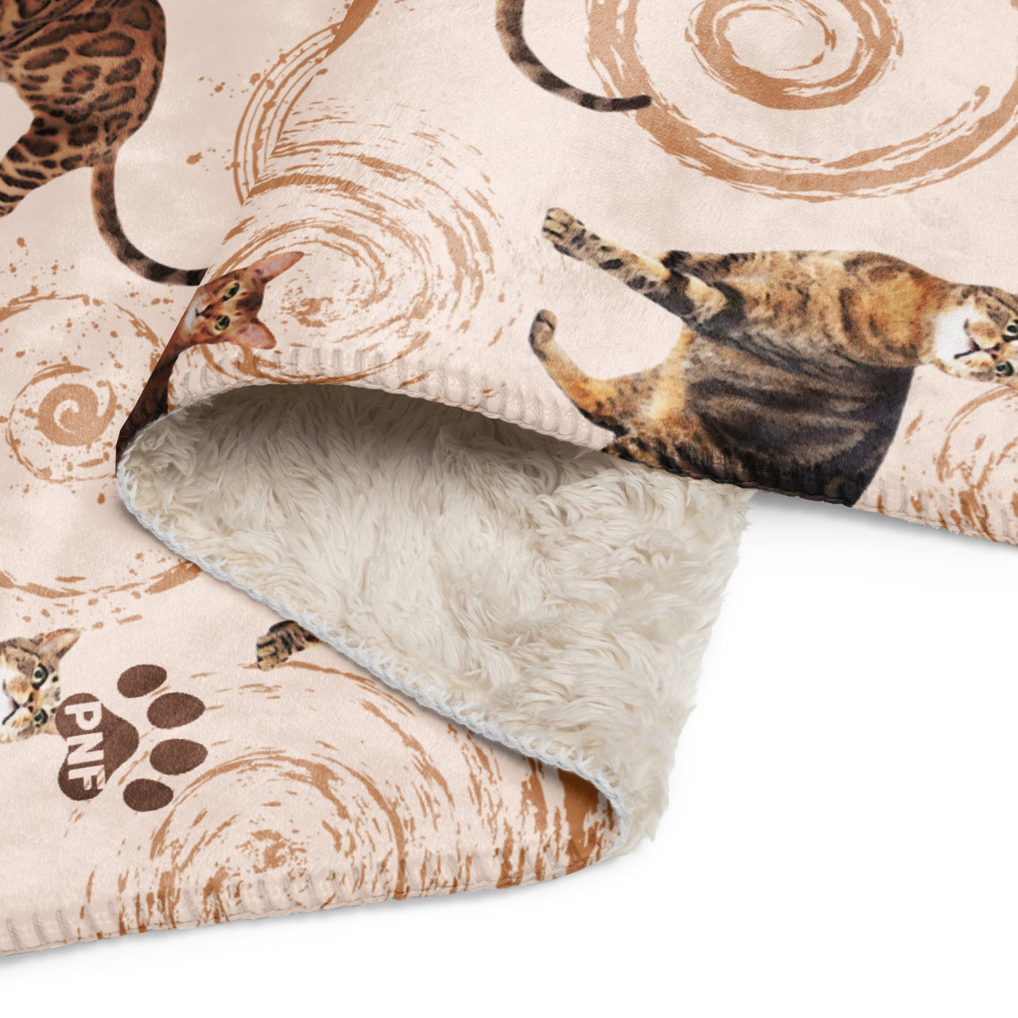 Cream sherpa blanket featuring illustrated cats in gray, brown, and tabby patterns surrounded by spiral swirls, luxury cat lover home décor by Pets N’ Faith.