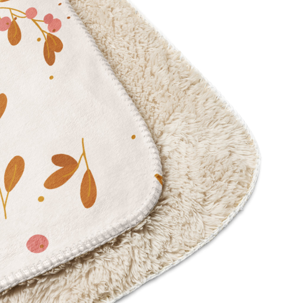 Close up view of floral sherpa blanket with a corgi with the words, " My Soul Is Covered in Faith and FUR". 