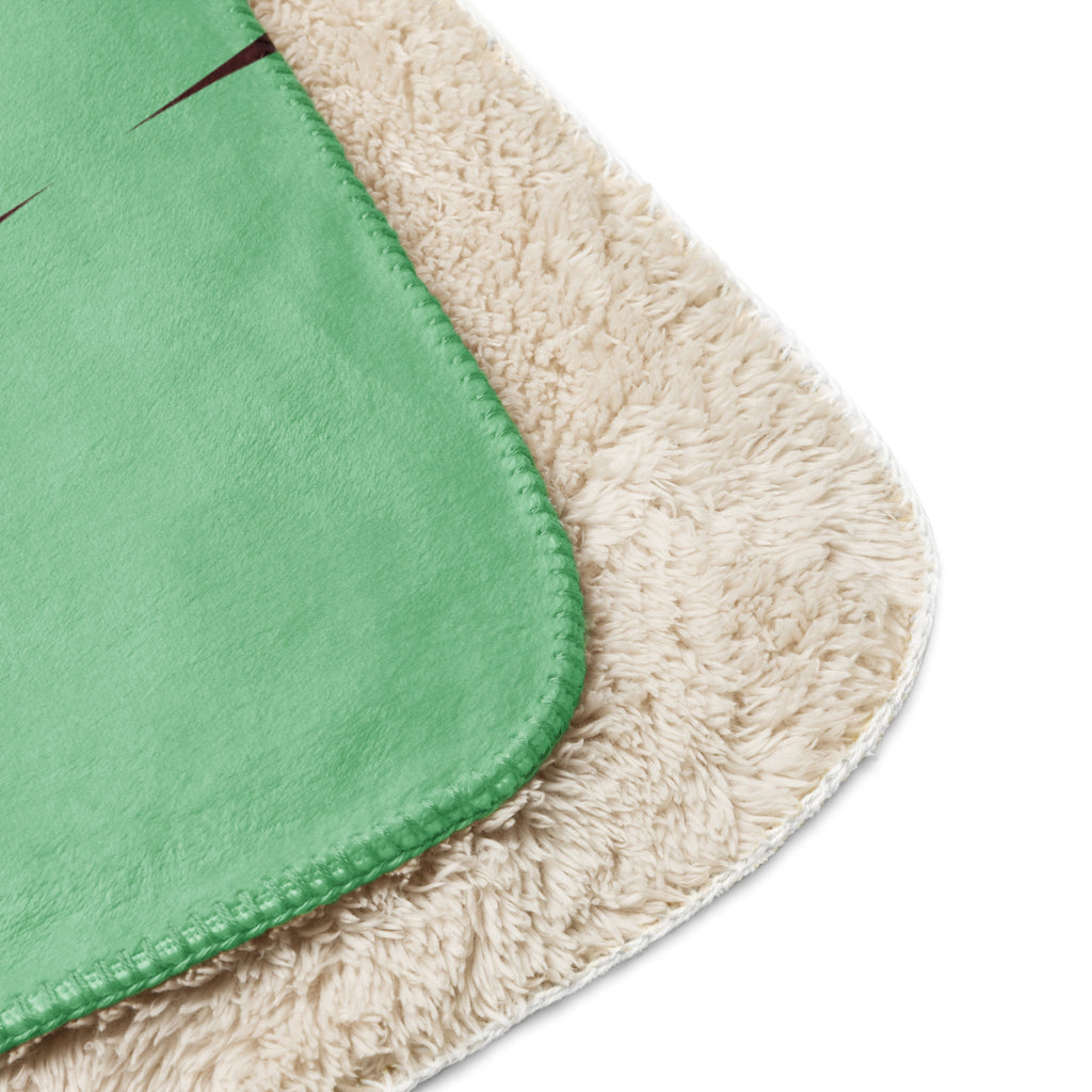 Sherpa blanket with orange, teal, and red geometric mid-century design featuring a black paw print in the corner, Pets N’ Faith faith-inspired throw