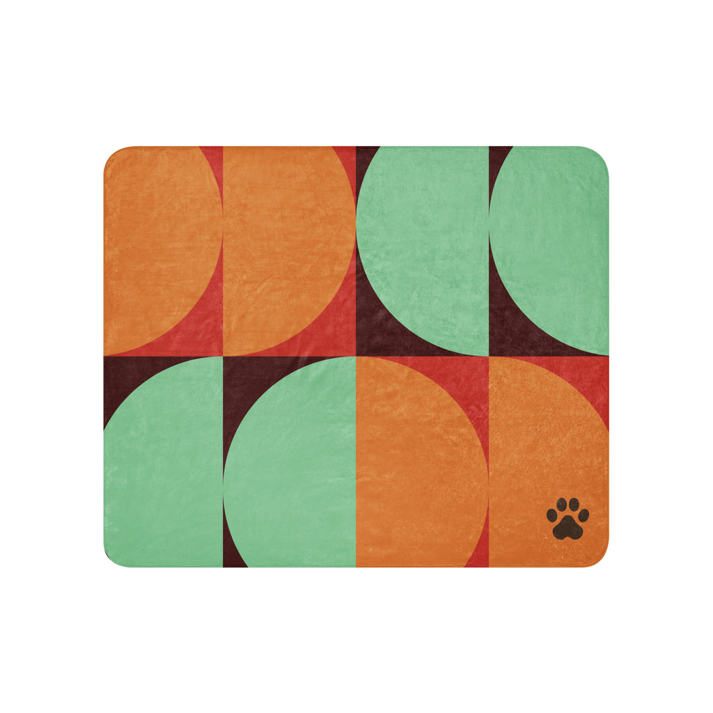 Sherpa blanket with orange, teal, and red geometric mid-century design featuring a black paw print in the corner, Pets N’ Faith faith-inspired throw