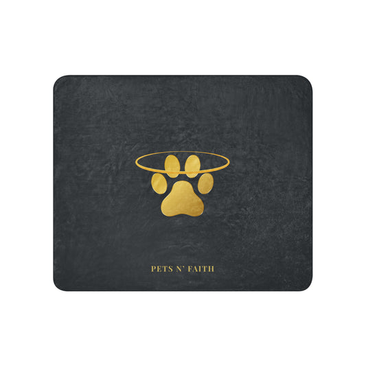 Black mouse pad with gold paw print design and 'Pets N' Faith' text on a white background
