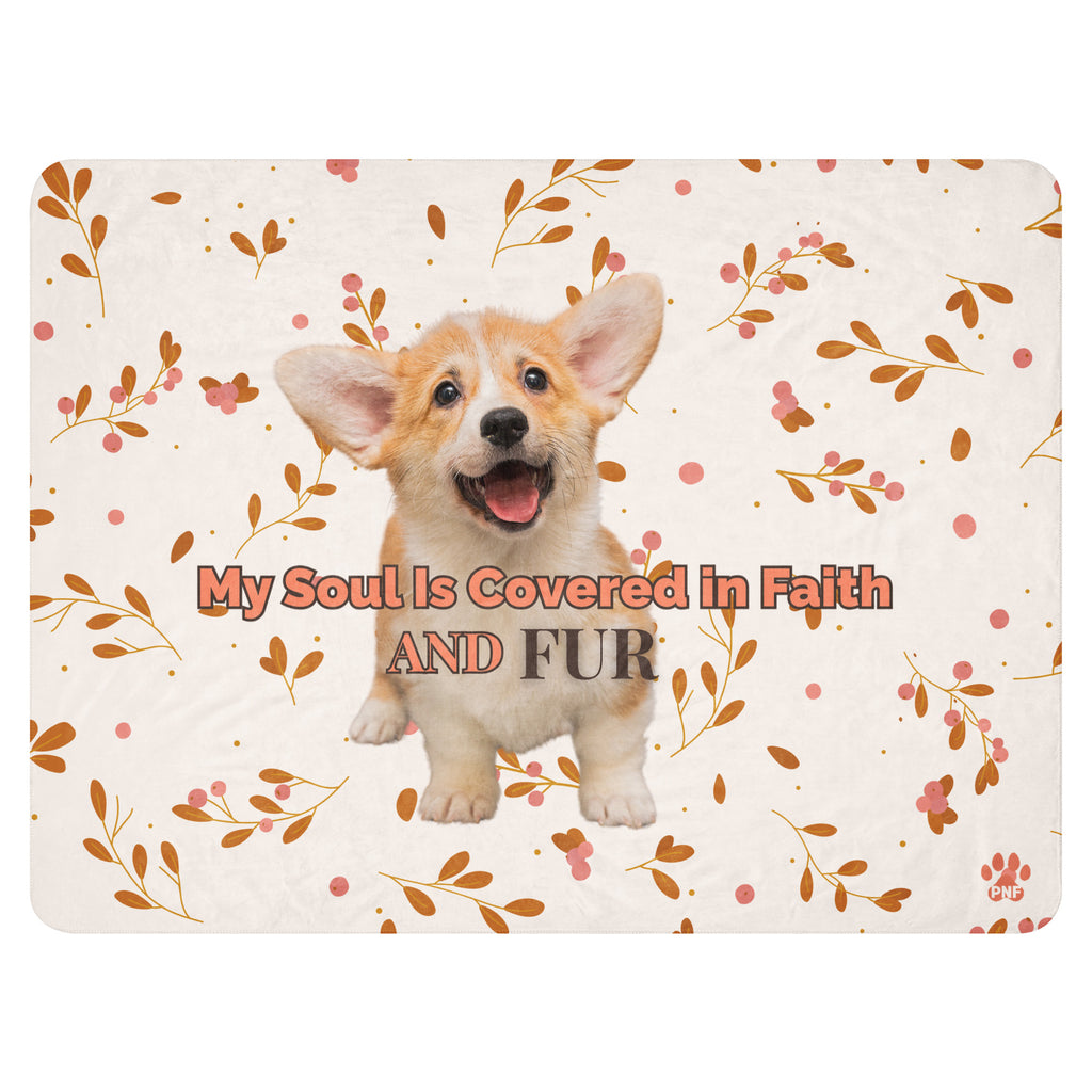 Flat view of floral sherpa blanket with a corgi with the words, " My Soul Is Covered in Faith and FUR". 