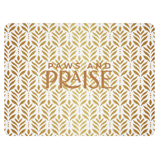 Sherpa blanket featuring a gold leaf pattern and “Paws and Praise” lettering in warm tones, a faith-inspired design that symbolizes gratitude, comfort, and the love between pets and their owners.
