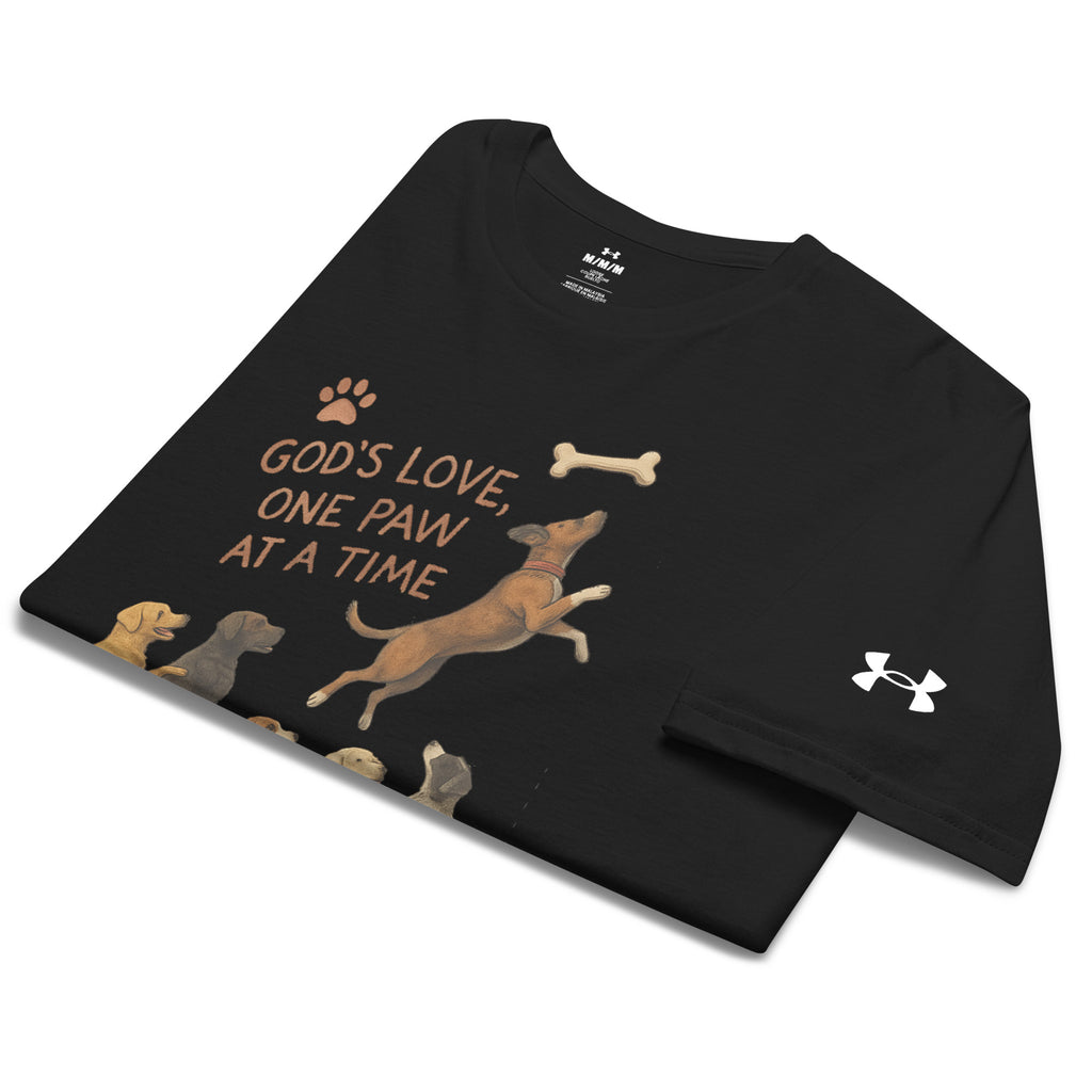 Folded black Under Armour Pets N’ Faith Performance T-Shirt with “God's Love, One Paw at A Time” design and Under Armour sleeve logo