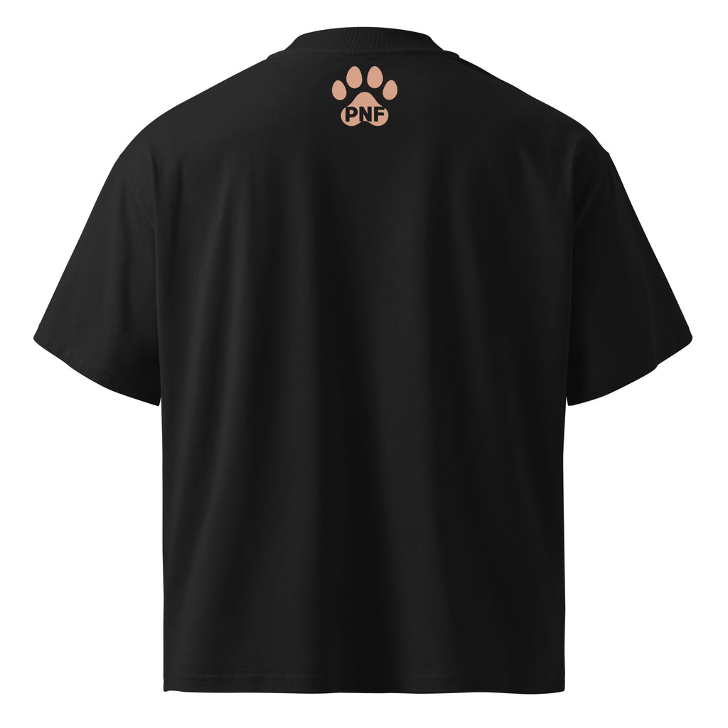 Back view of a black unisex t-shirt featuring a gold heart with a crown and pink paw prints, symbolizing faith and love for animals.