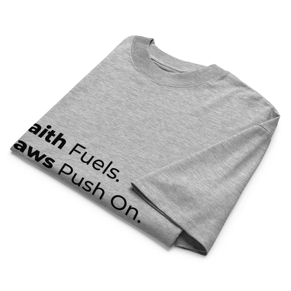 Folded heather gray oversized Pets N Faith t-shirt with faith-inspired slogan partly visible