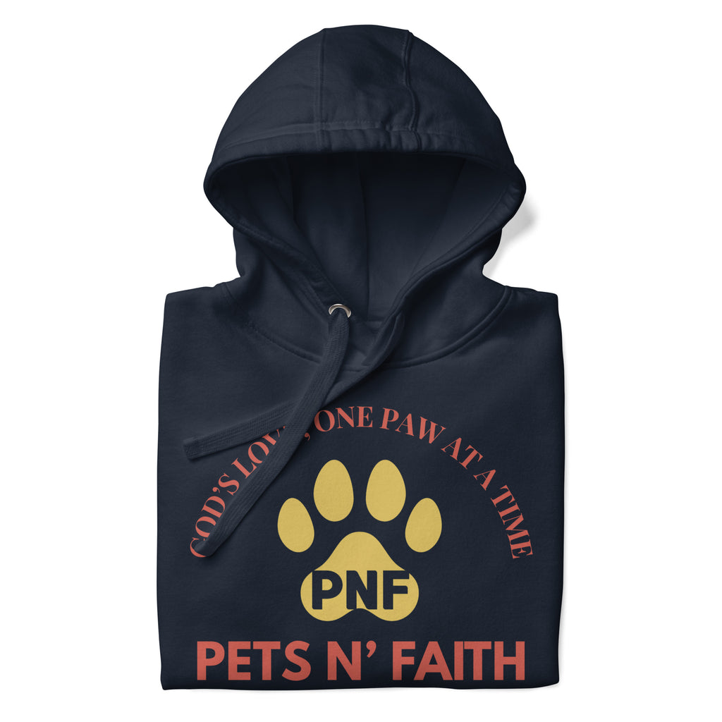 Folded view of navy Unisex Pets N’ Faith hoodie with yellow paw print logo and red text design