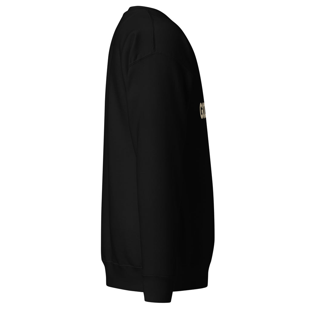 Black unisex sweatshirt featuring the GOD IS LOVE design with a paw print in place of the ‘O’ in ‘Love’ by Pets N’ Faith