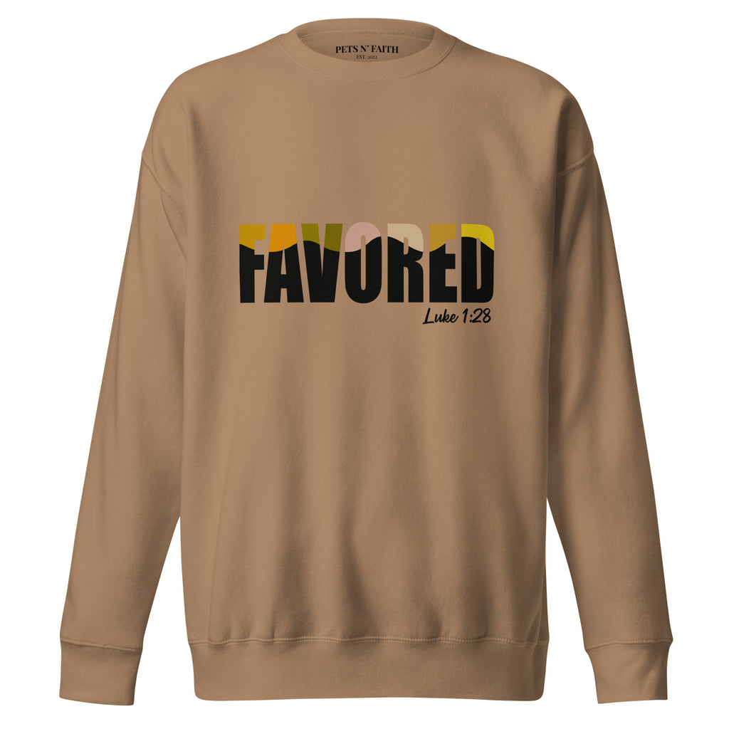Latte unisex sweatshirt with colorful FAVORED typography and Luke 1:28 scripture reference, designed by Pets N’ Faith.