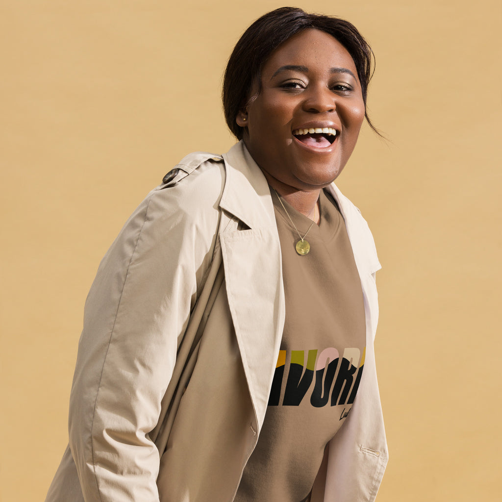 Latte unisex sweatshirt with colorful FAVORED typography and Luke 1:28 scripture reference, designed by Pets N’ Faith.