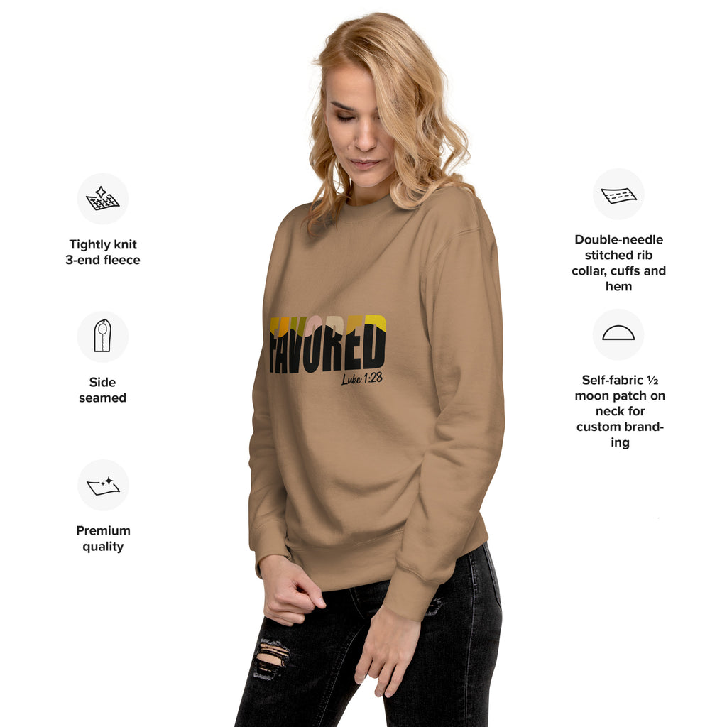 Latte unisex sweatshirt with colorful FAVORED typography and Luke 1:28 scripture reference, designed by Pets N’ Faith.