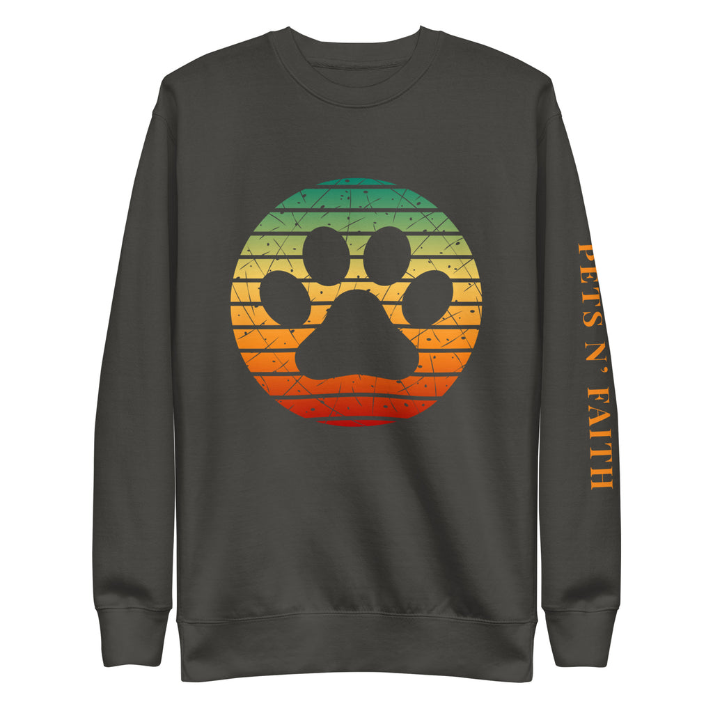 Vintage black unisex sweatshirt with a retro sunset-style paw print and PETS N’ FAITH text on the sleeve.