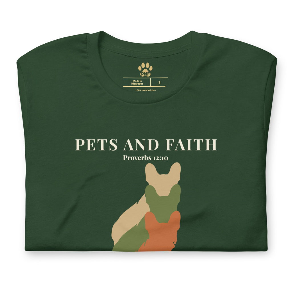 Folded view of Forest green Pets N Faith unisex dog t-shirt with Proverbs 12:10 scripture and layered dog silhouette graphic.