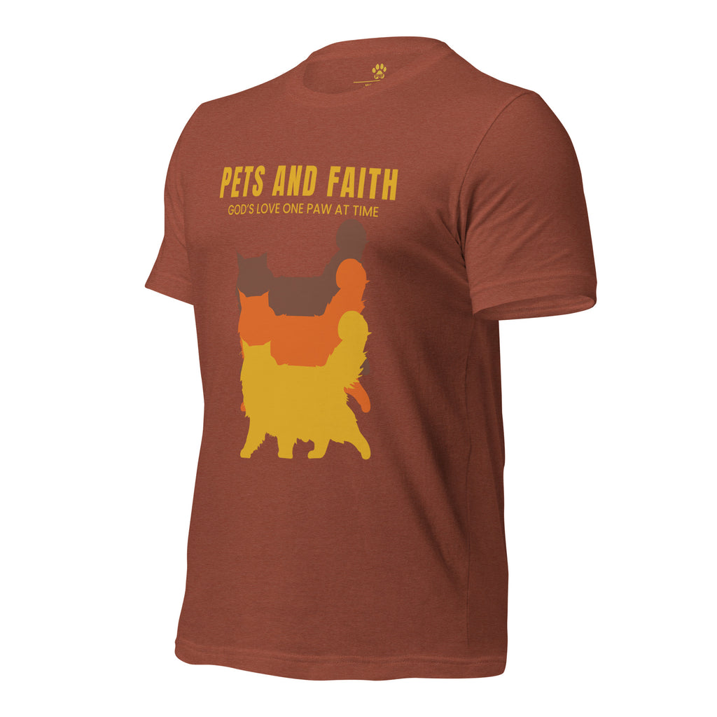 Side view of autumn Pets N Faith unisex cat t-shirt with ‘God’s Love One Paw at a Time’ text and layered cat silhouette design