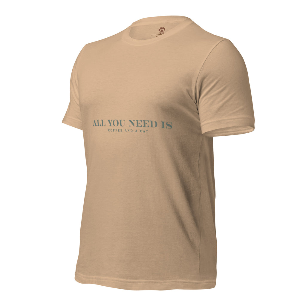Tan unisex T-shirt with teal text reading ‘All You Need Is Coffee and a Cat