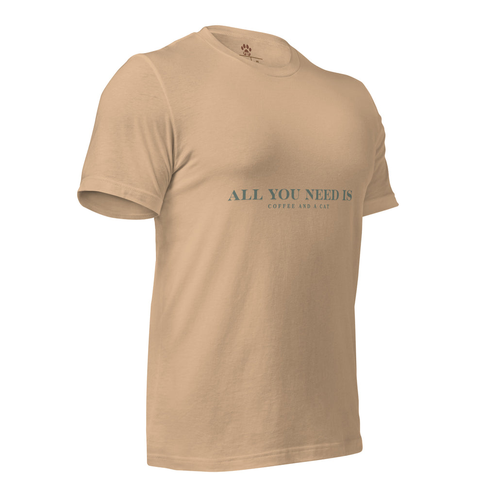 Tan unisex T-shirt with teal text reading ‘All You Need Is Coffee and a Cat