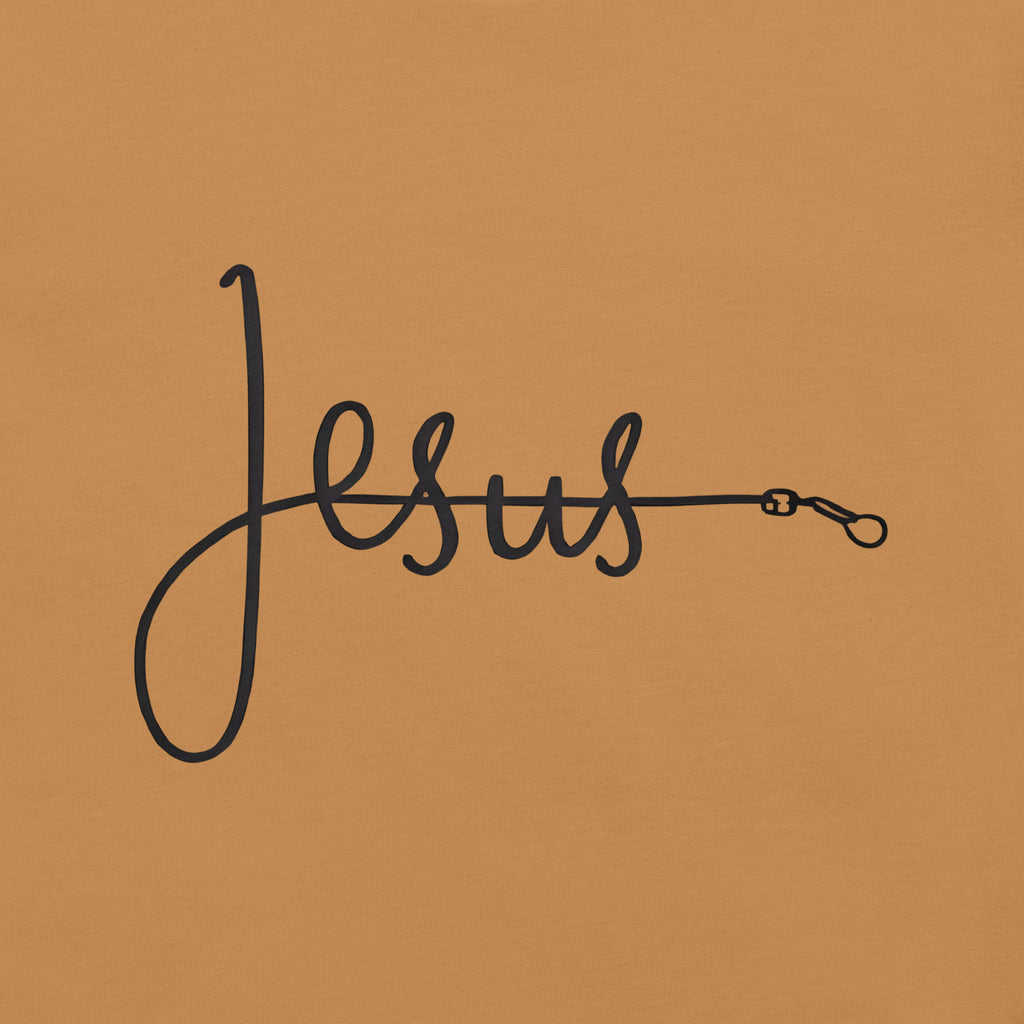 Tan  unisex T-shirt with the word ‘Jesus’ in a flowing script design