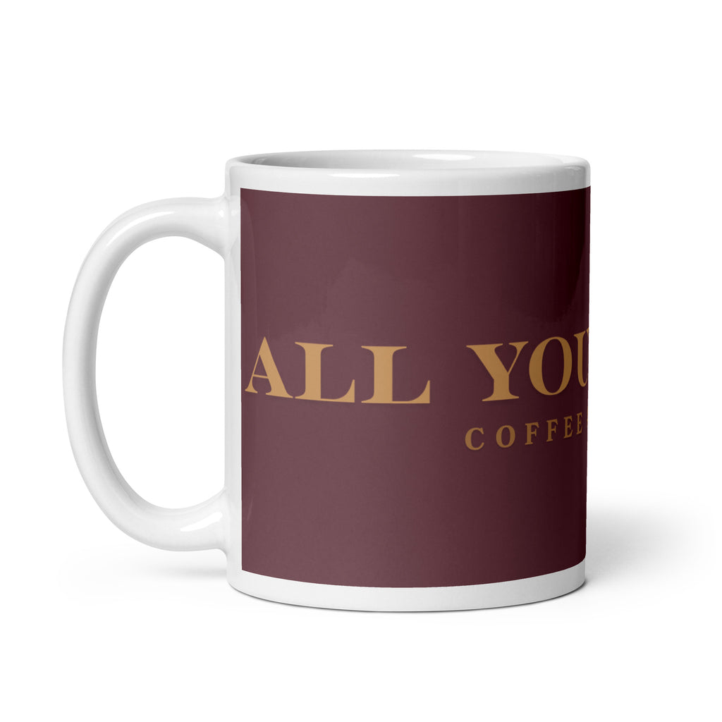 An white glossy mug with the graphic stating, " All You Need is Coffee and A Dog" 