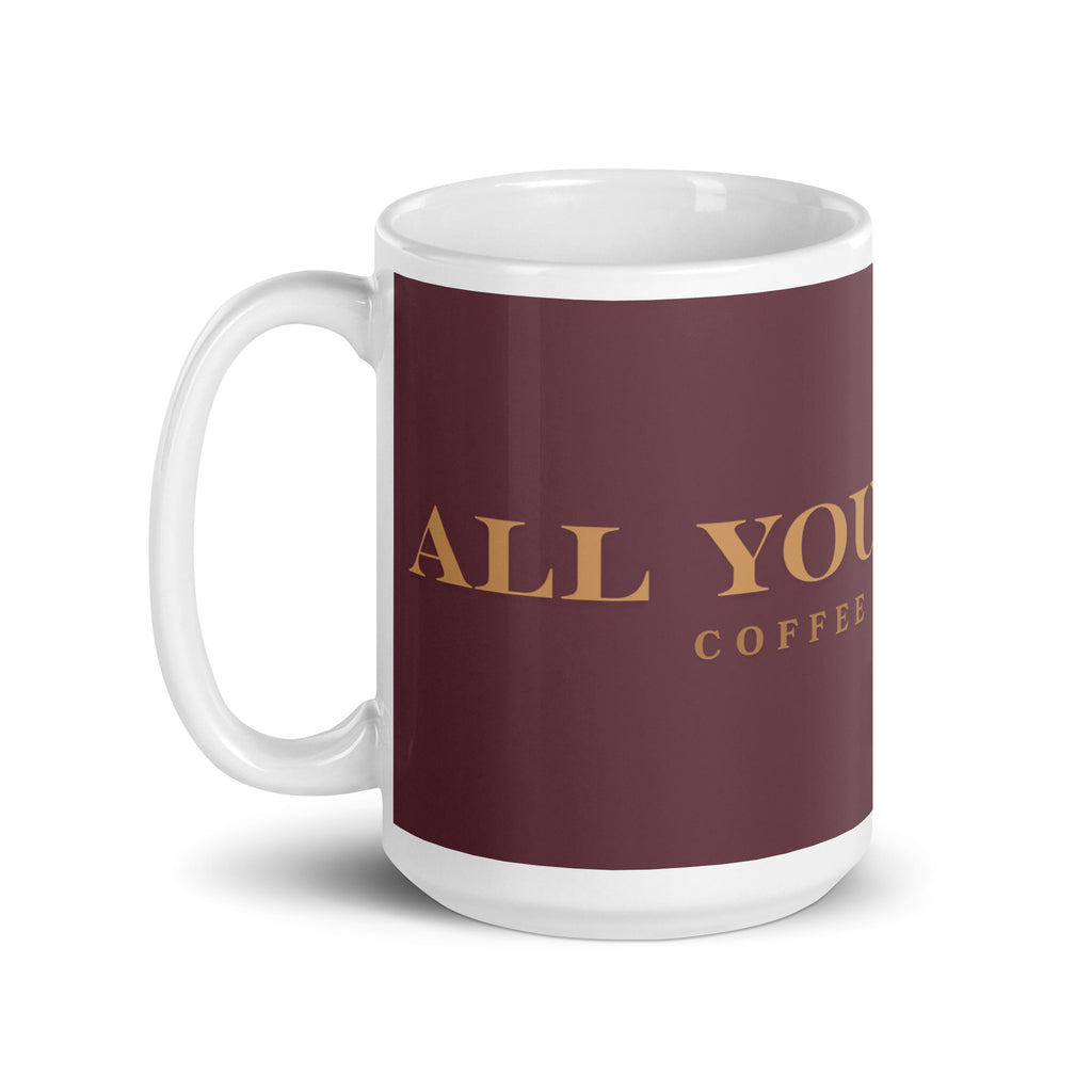 A white glossy mug with the graphic stating, " All You Need is Coffee and A Dog" 