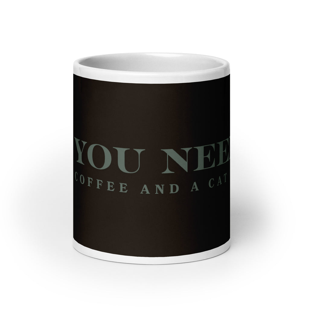 A white glossy mug with the graphic stating, " All You Need is Coffee and A Cat" 