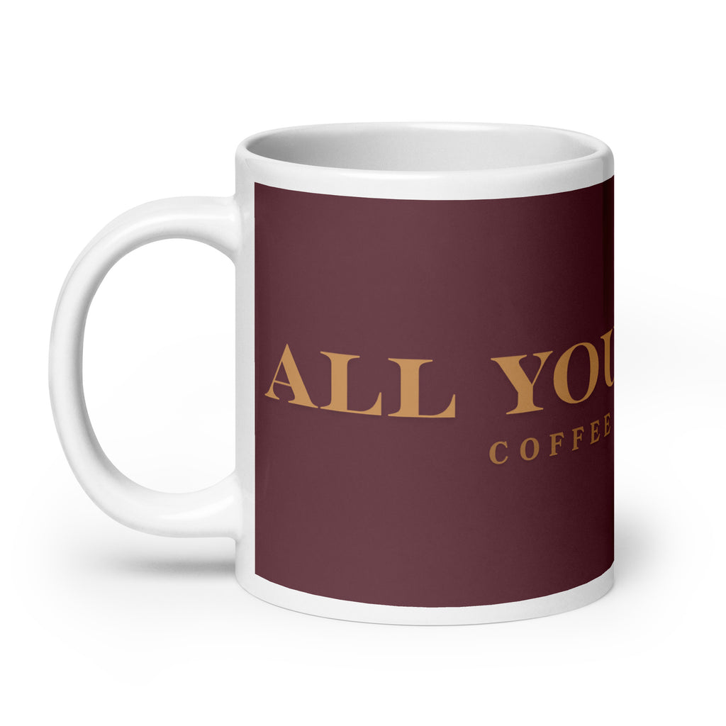 An white glossy mug with the graphic stating, " All You Need is Coffee and A Dog" 
