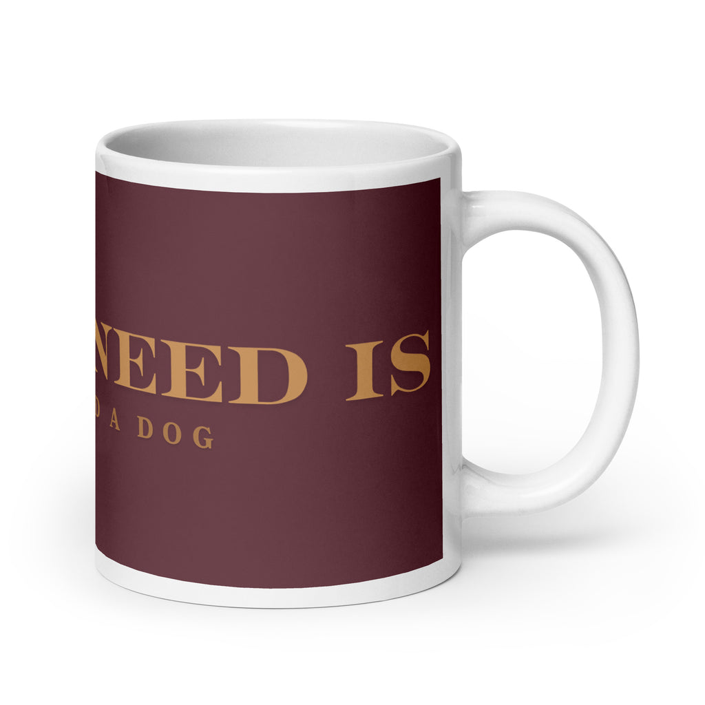 An white glossy mug with the graphic stating, " All You Need is Coffee and A Dog" 